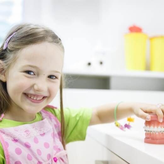 Young child with beautiful smile after cosmetic dentistry