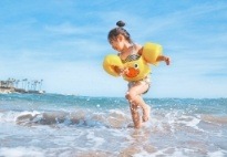 Child playing on the beach