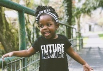 Smiling child playing outdoors