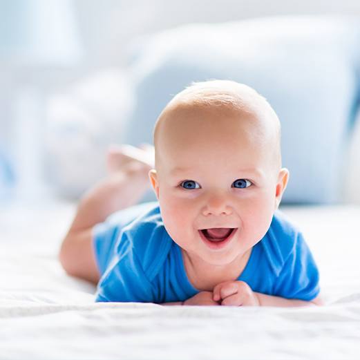 Baby smiling after lip and tongue tie visit