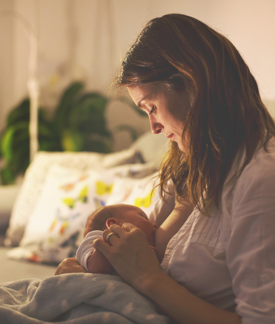 Woman breastfeeding baby