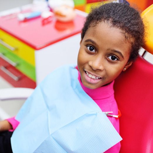 Girl smiling after nitrous oxide dental sedation for kids in Papillion  