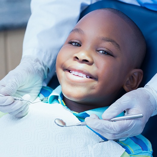 Child relaxed in dental chair
