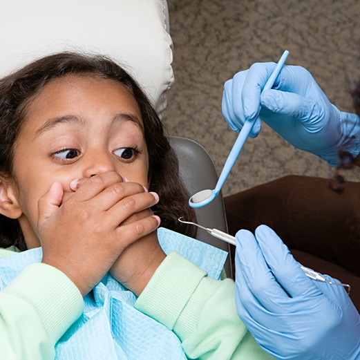 Child afraid at dentist