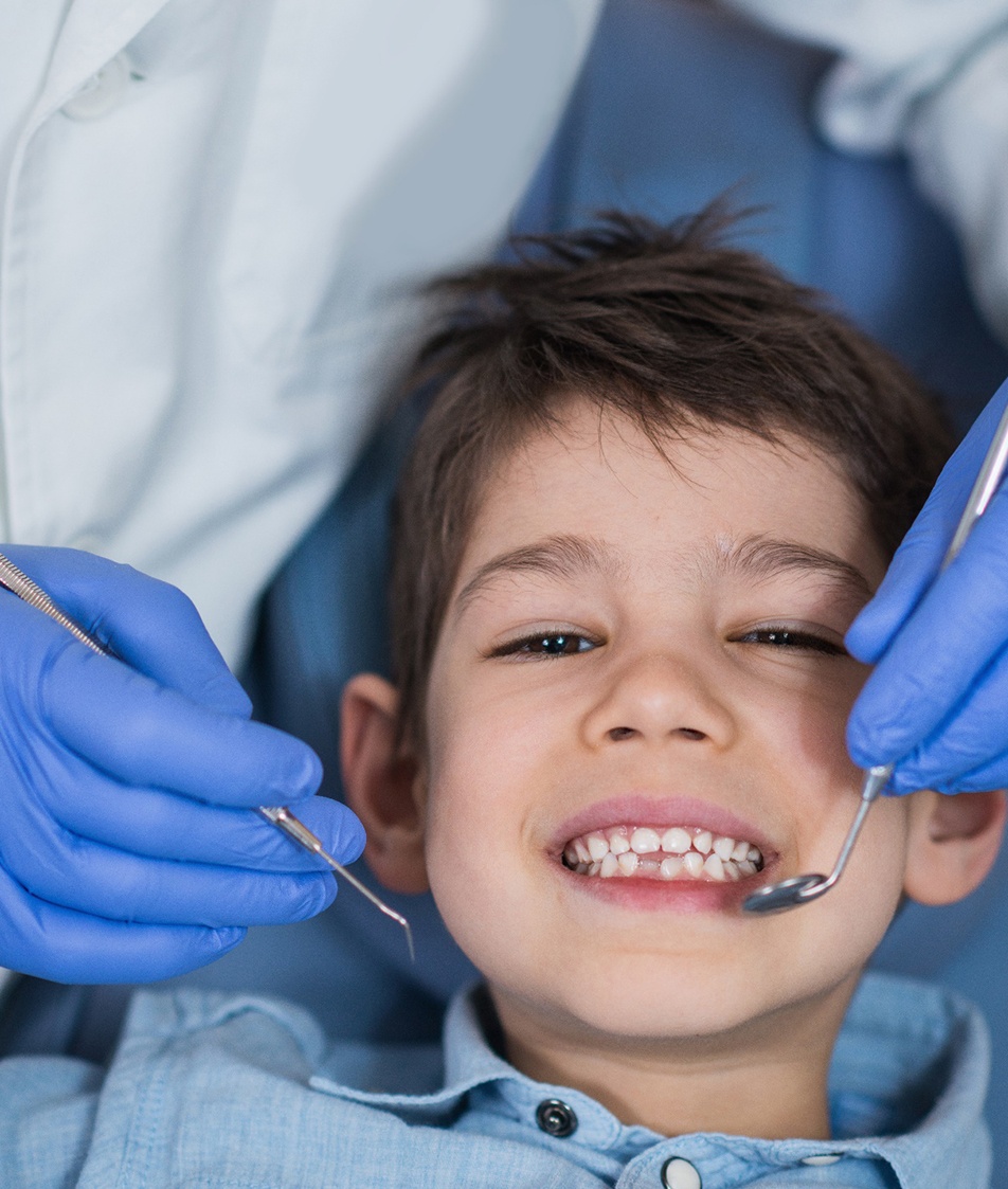 a toddler receiving care from their pediatric dentist in Papillion