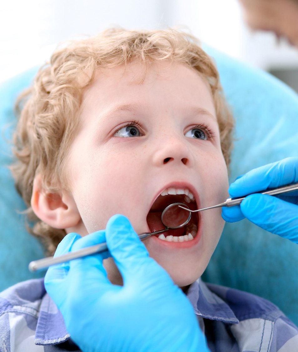 a toddler receiving care from their pediatric dentist in Papillion