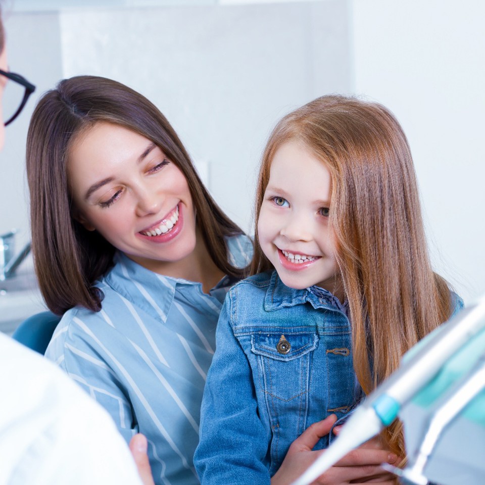 A family at the pediatric dentist