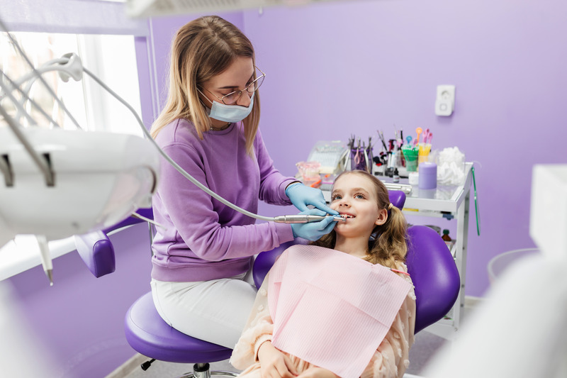 Young patients smiling during pulp therapy