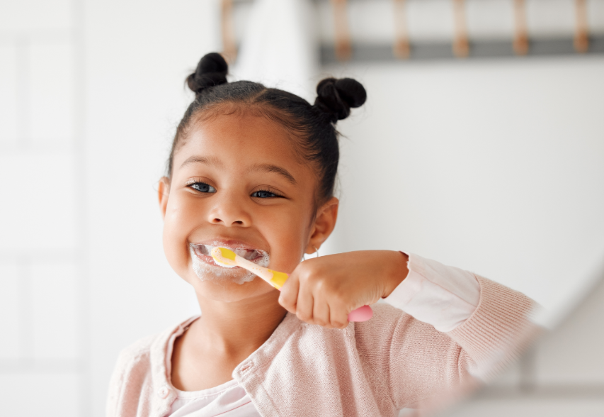 Little girl brushing teeth