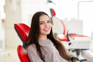 Teen smiling at the dentist